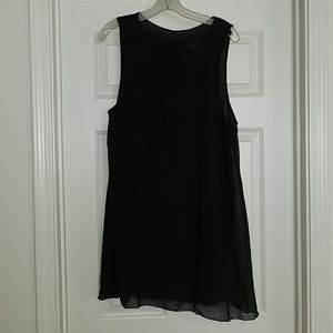 SOLD...Criss cross front sheer black dress